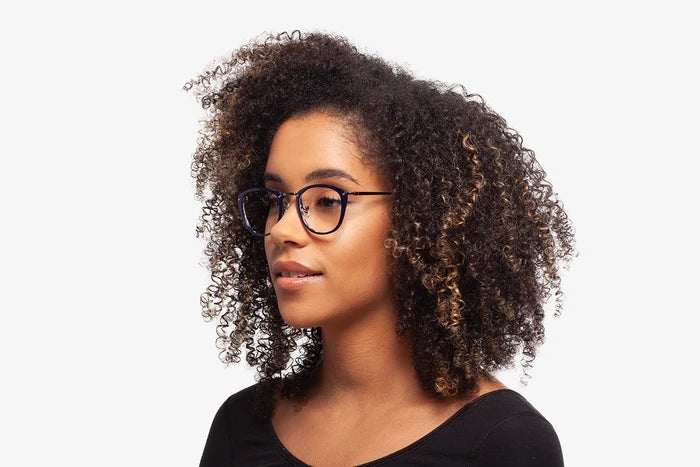 Blue Casey eyeglasses by Chemistrie worn by female model, side view