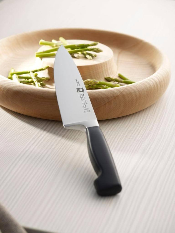 Couteau de chef Zwilling Four Star lame forgée 20 cm