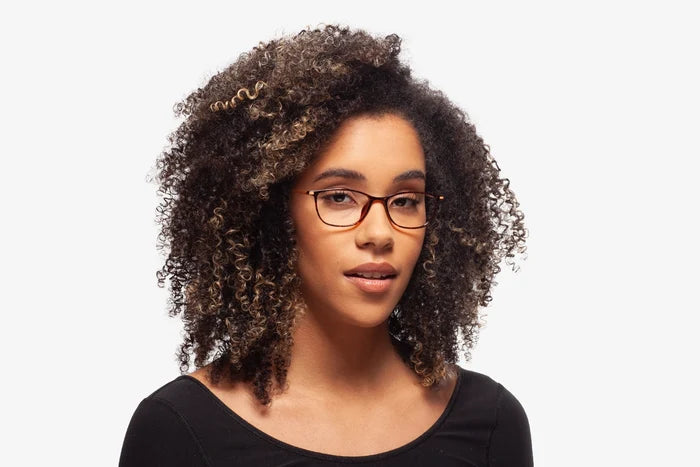 Burgundy Deborah eyeglasses by Chemistrie worn by female model, front view