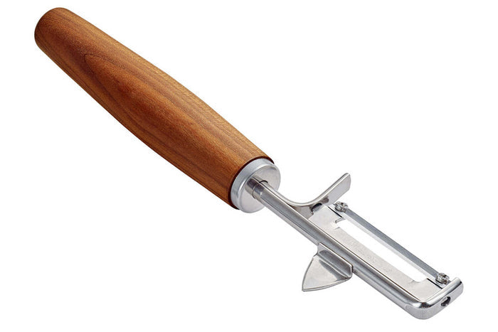 Éplucheur Triangle Sense lame mobile en inox et manche prunier - Gaucher