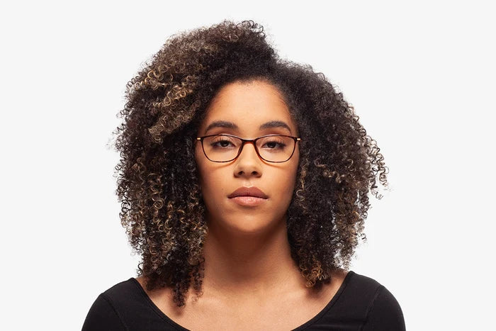 Tortoise Evan eyeglasses by Chemistrie worn by female model, front view