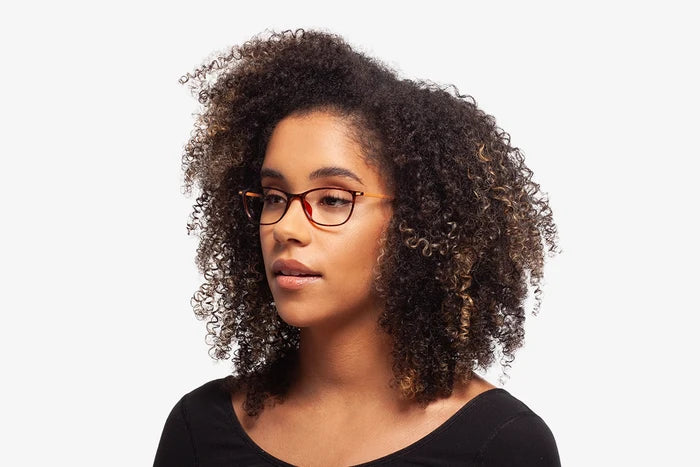 Tortoise Evan eyeglasses by Chemistrie worn by female model, side view