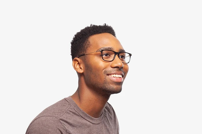 Black Evan eyeglasses by Chemistrie worn by male model, side view