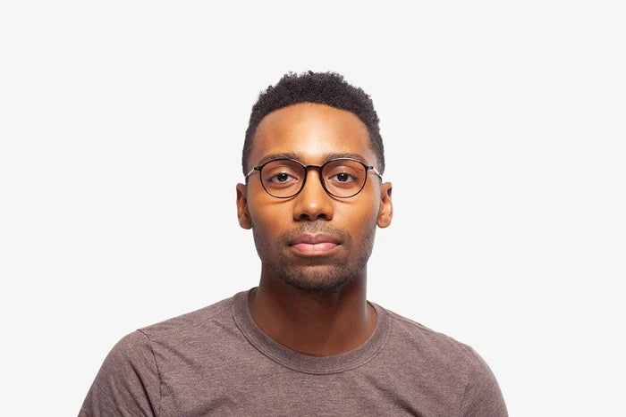 Black Frankie eyeglasses by Chemistrie worn by male model, front view