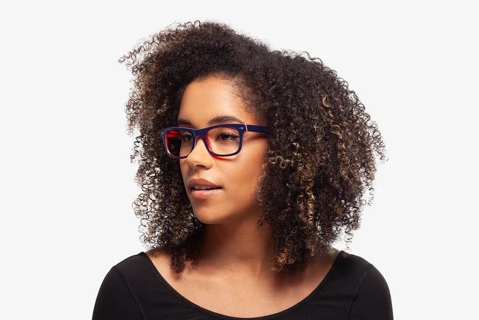 Blue and Red Jack eyeglasses by Chemistrie worn by female model, front view