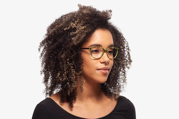Green Tortoise Modena eyeglasses by Chemistrie worn by female model, front view