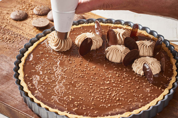 Moule à tarte cannelé en acier De Buyer à fond amovible et bord droit