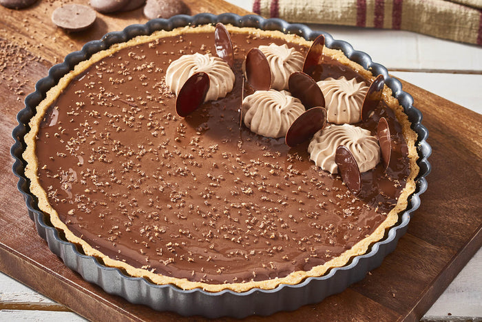 Moule à tarte cannelé en acier De Buyer à fond fixe bord droit