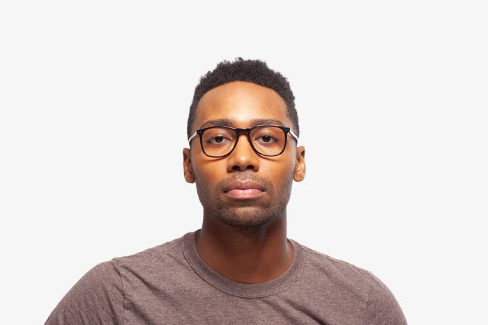 Black Pesaro eyeglasses by Chemistrie worn by male model, front view