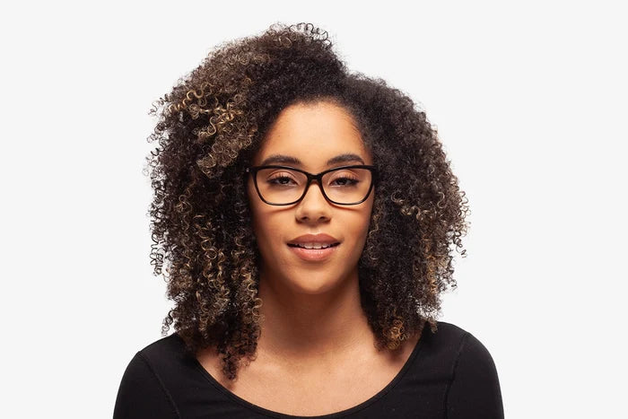 Black Rachel eyeglasses by Chemistrie worn by female model, front view
