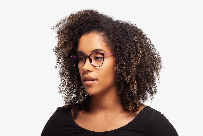 Purple Taylor eyeglasses by Chemistrie worn by female model, side view