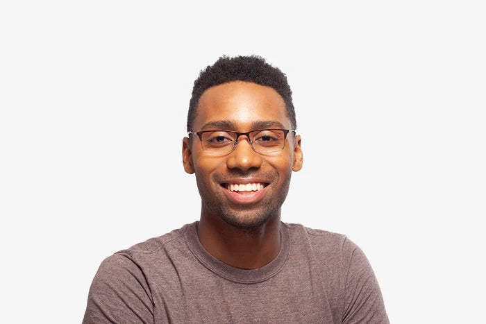 Amber Tortoise Thomas eyeglasses by Chemistrie worn by male model, front view