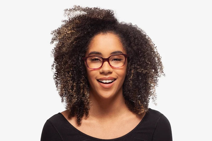 Cranberry Venice eyeglasses by Chemistrie worn by female model, front view